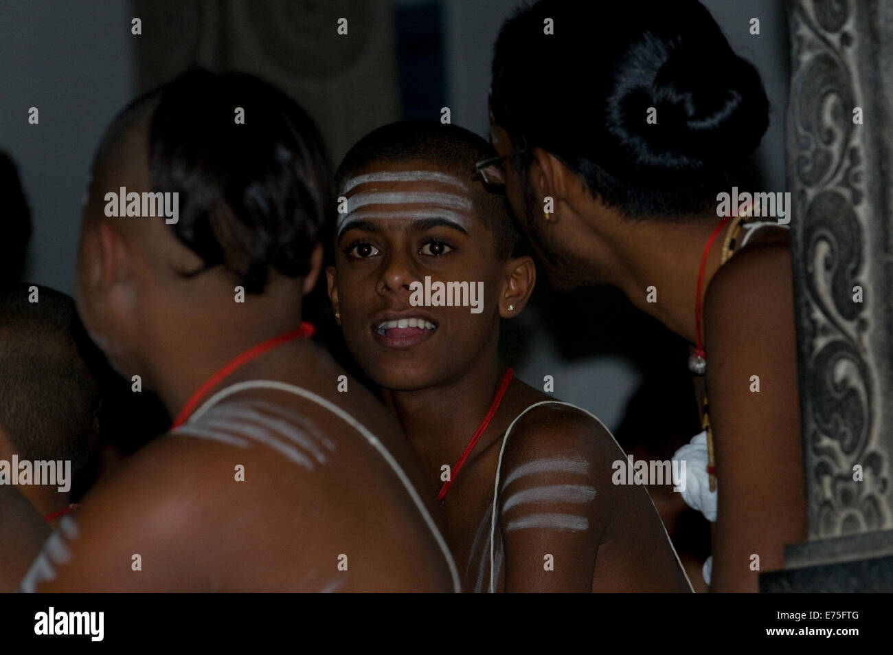Young Brahmin student priests with sacred ash markings (Trimurthi) to Lord Shiva in Temple at Sri Ramana Maharshi Ashram Stock Photo