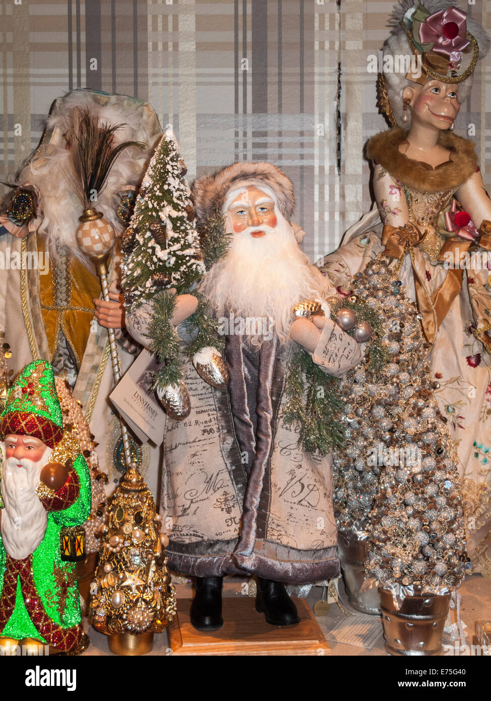 Traditional Santa Claus / St Nicholas Father Christmas figure in a festive shop display in Manhattan, New York Stock Photo