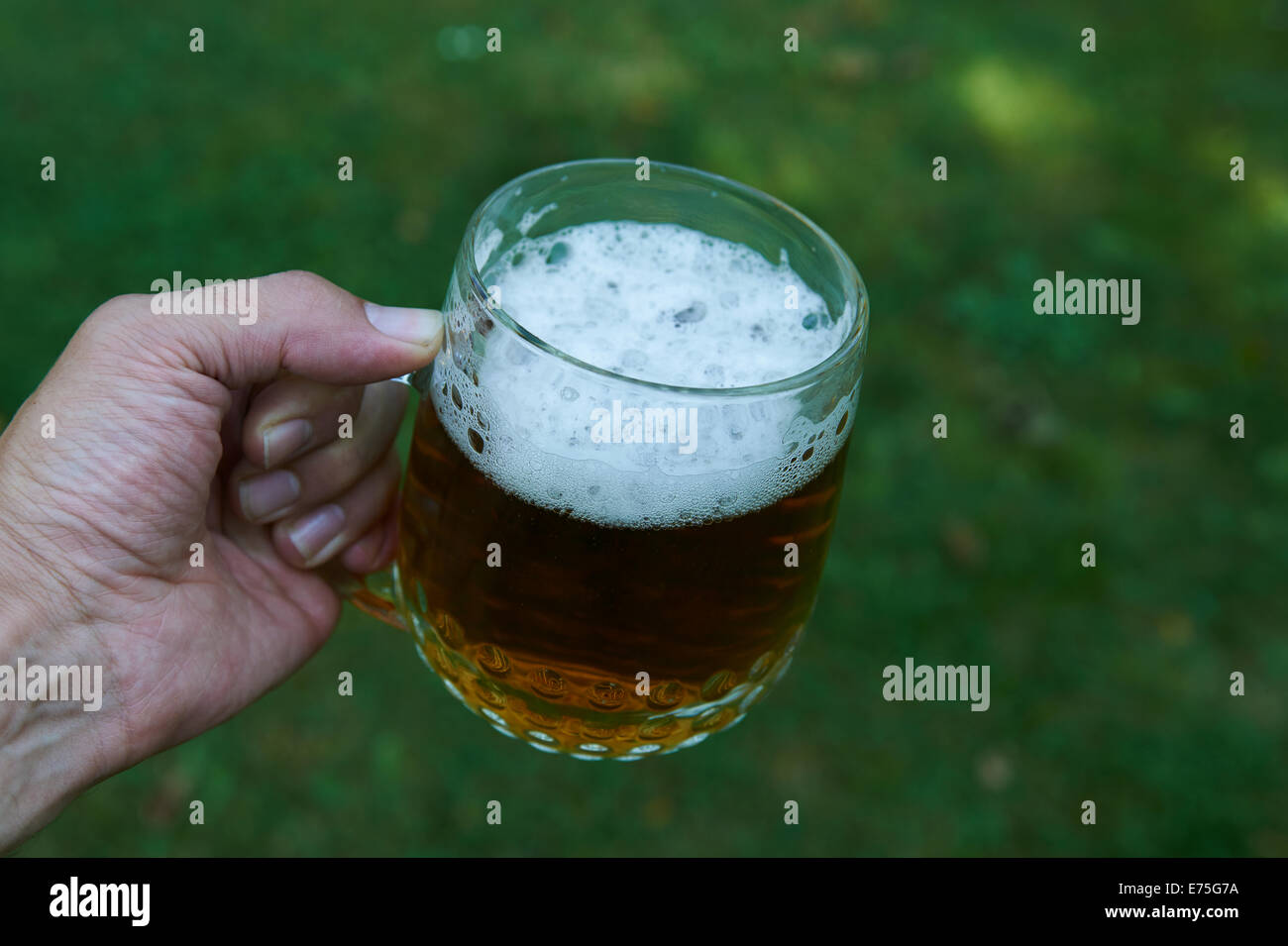 Hand holding glass beer hires stock photography and images Alamy