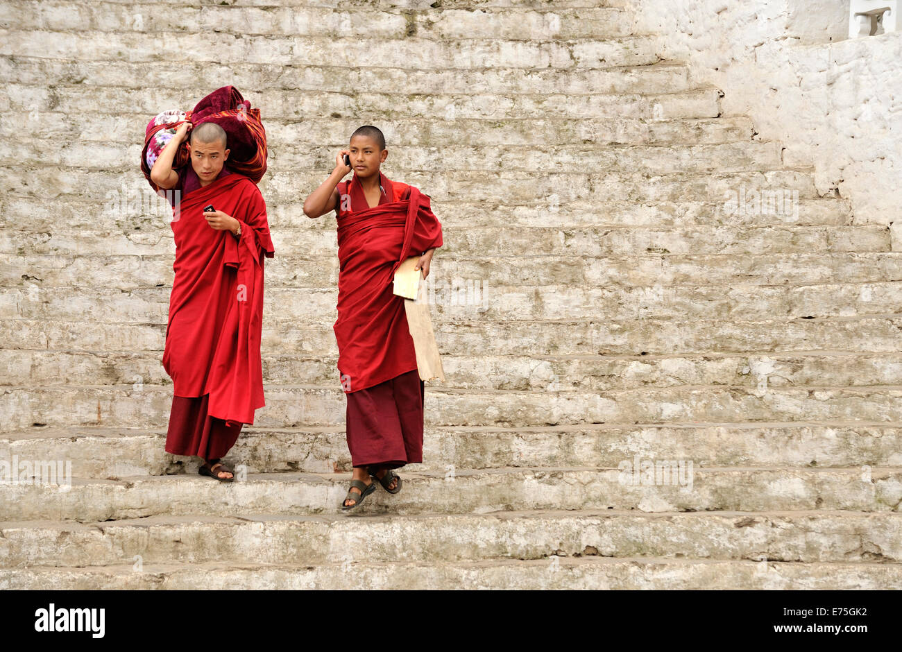 Two monks, Punakha Dzong, Bhutan Stock Photo