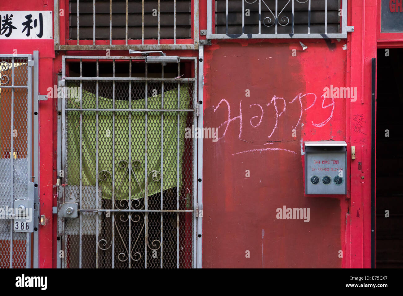 Graffiti in doorway in Chinatown, San Francisco Stock Photo