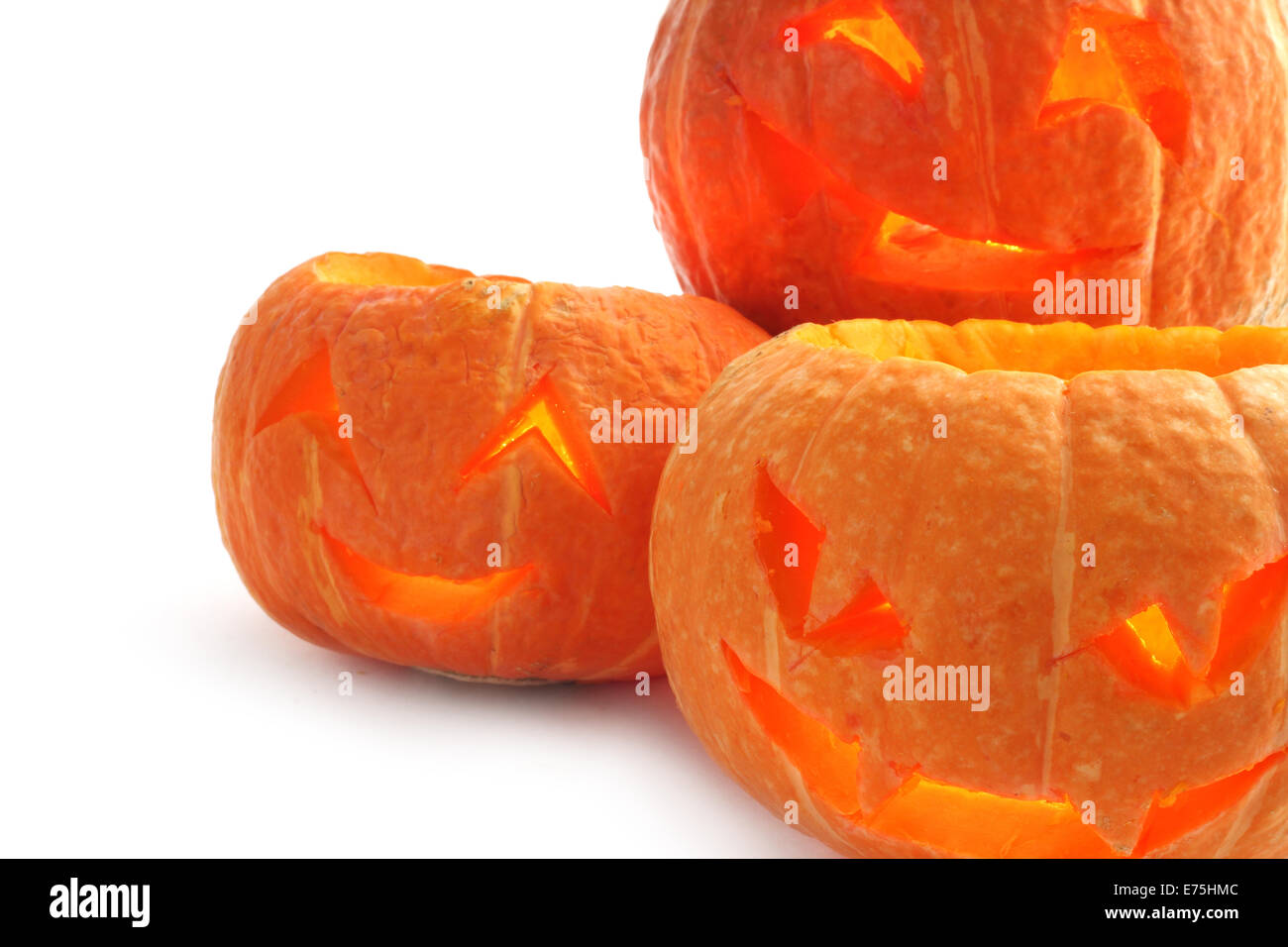 Glowing Halloween Pumpkins isolated on white background Stock Photo - Alamy