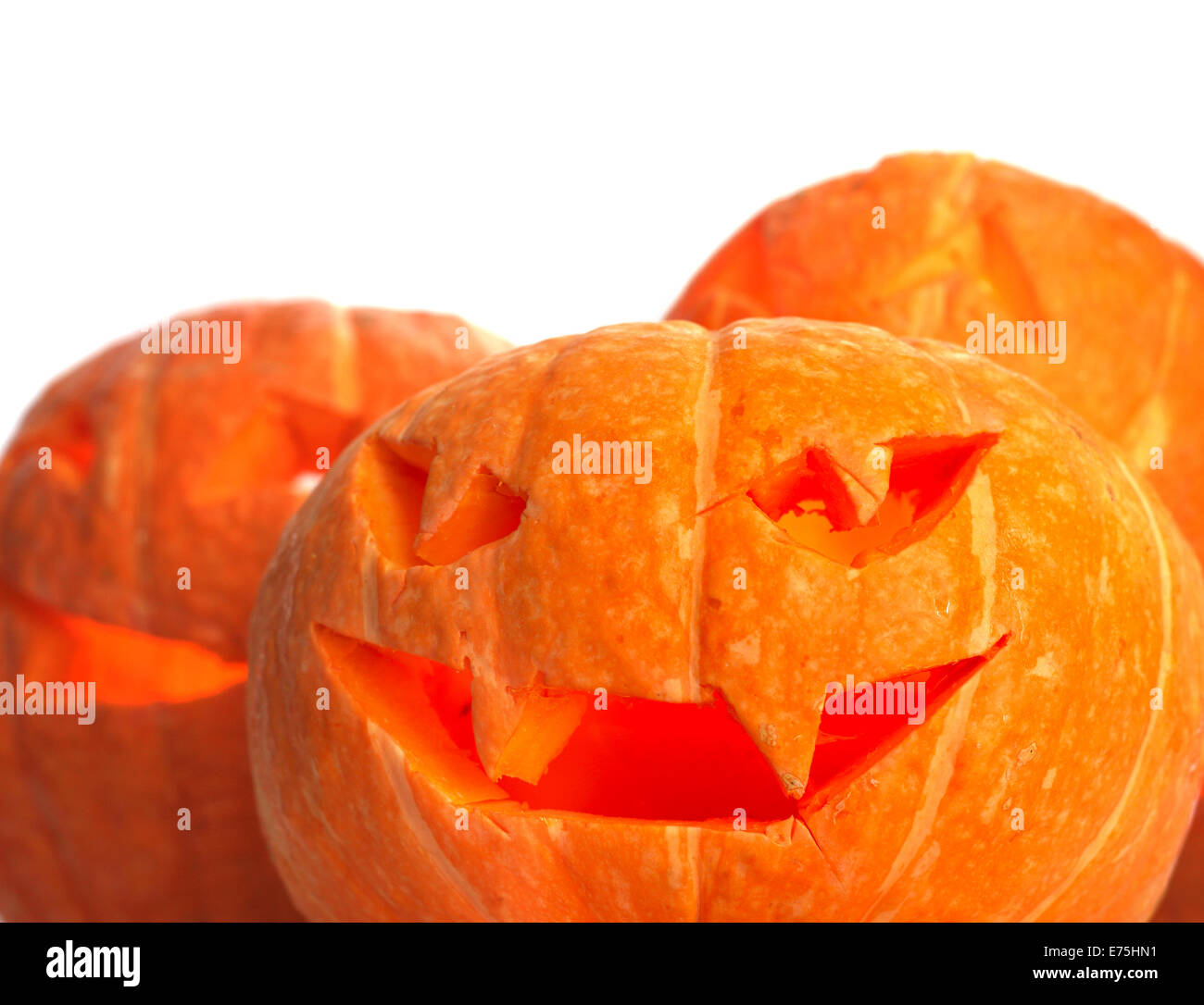 Glowing Halloween Pumpkins isolated on white background Stock Photo - Alamy