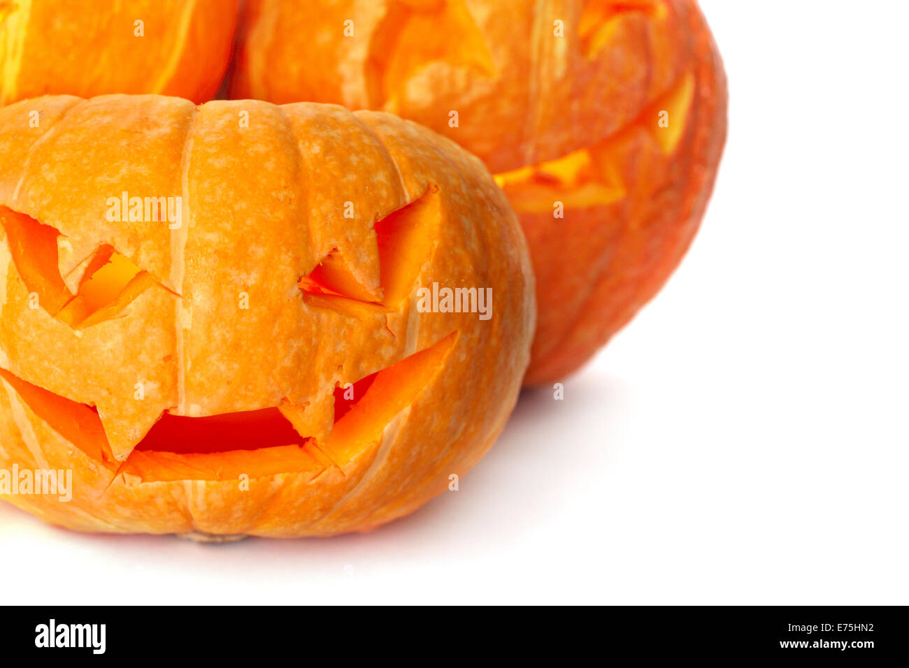 Glowing Halloween Pumpkins isolated on white background Stock Photo - Alamy