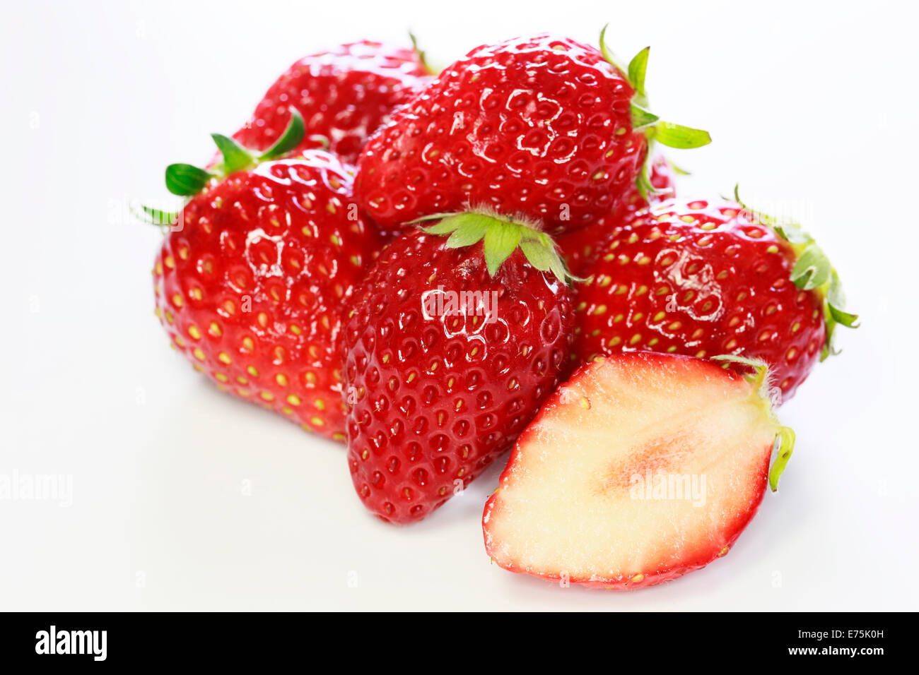 Fresh strawberries were placed on a white background Stock Photo - Alamy