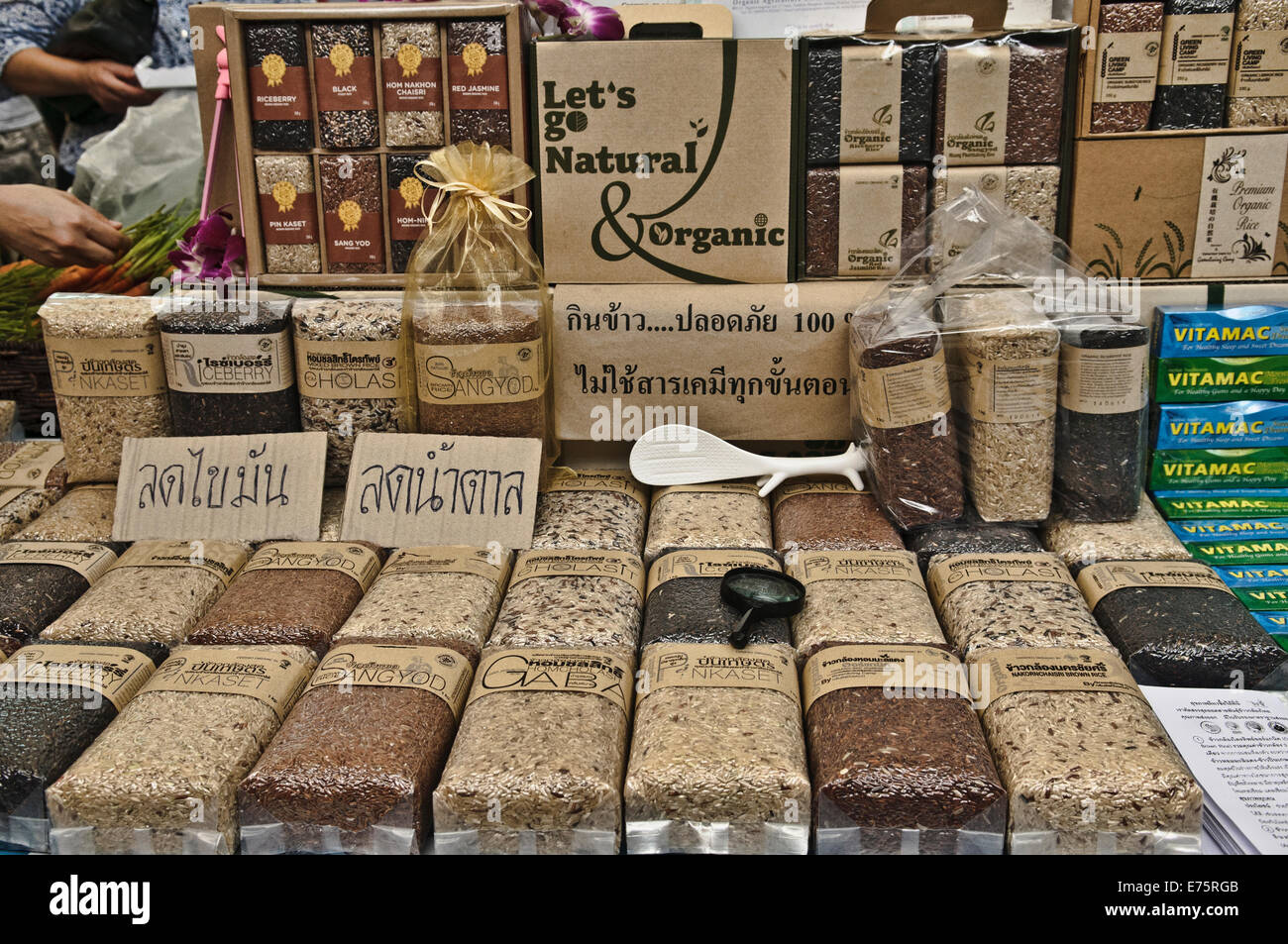 Organic rice in packs sold at the Farmers Market in Bangkok, Thailand Stock Photo