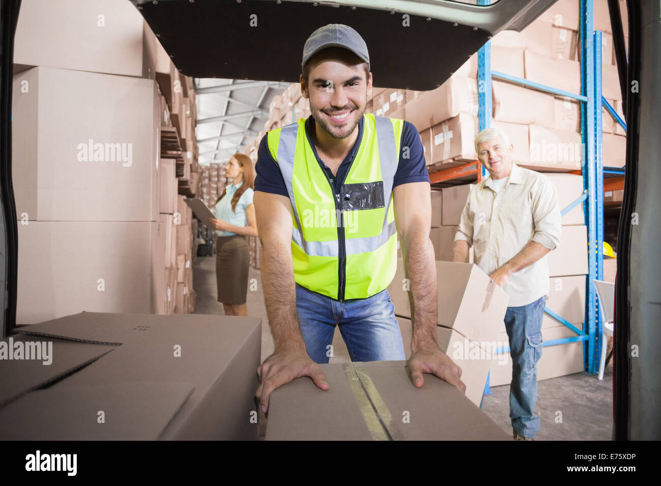 Delivery driver packing van hi-res stock photography and images - Alamy