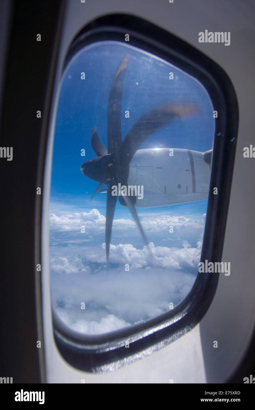 View from a cabin window, turboprop aircraft ATR 72-500, in flight, Asia Stock Photo