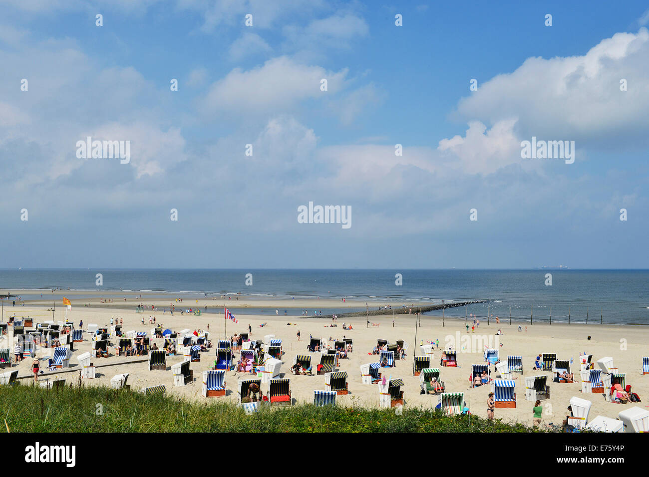 Roofed wicker beach chairs on the beach, Wangerooge, Friesland, Lower Saxony, Germany Stock Photo