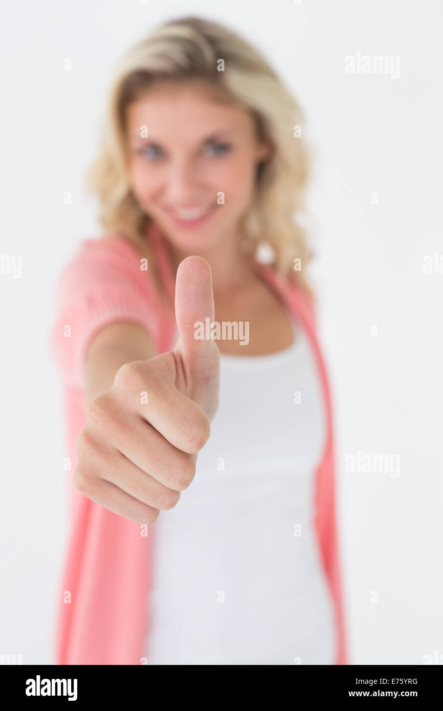 Happy young woman thumbs up hi-res stock photography and images - Alamy