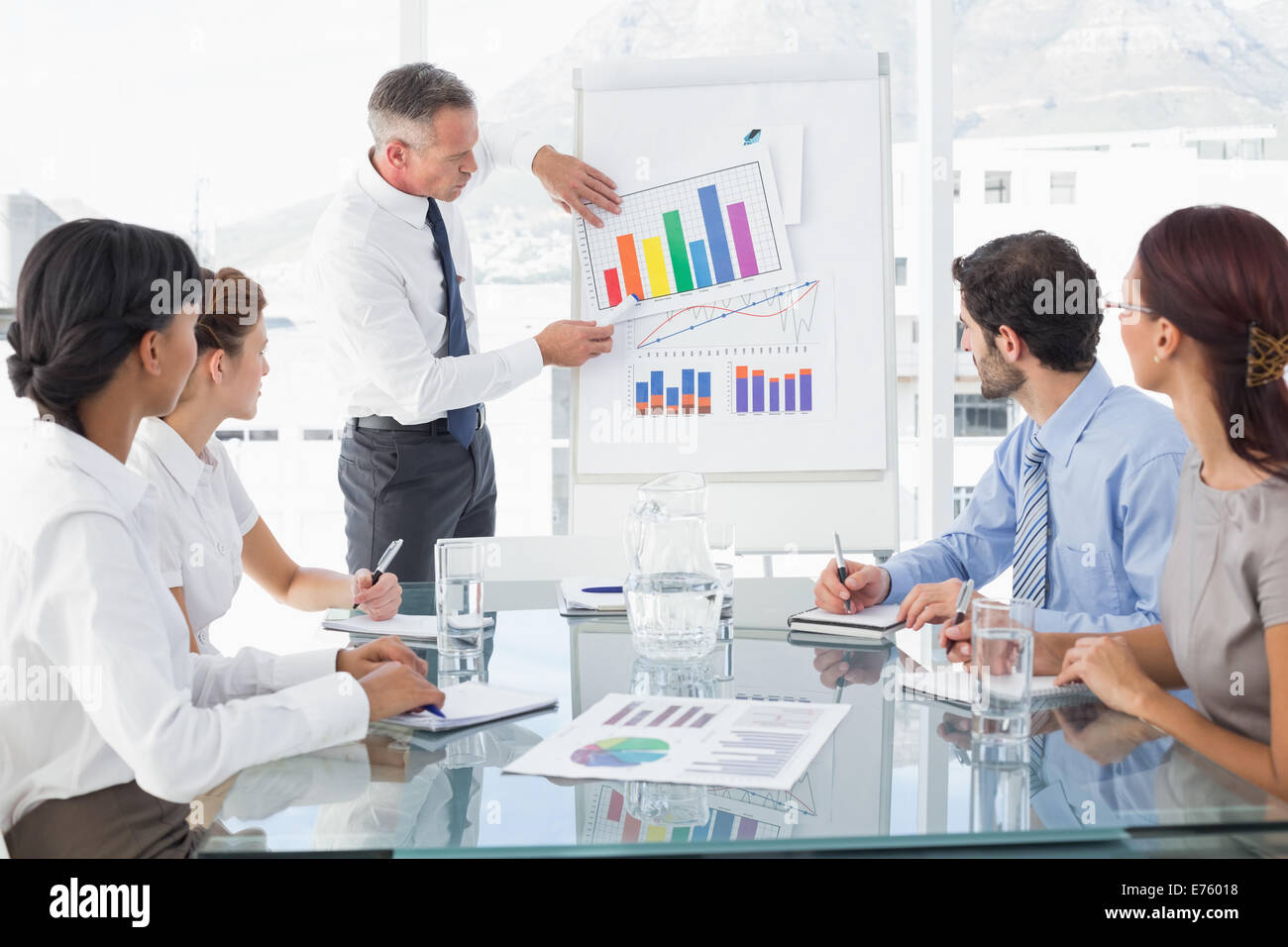 Business man giving a presentation Stock Photo - Alamy