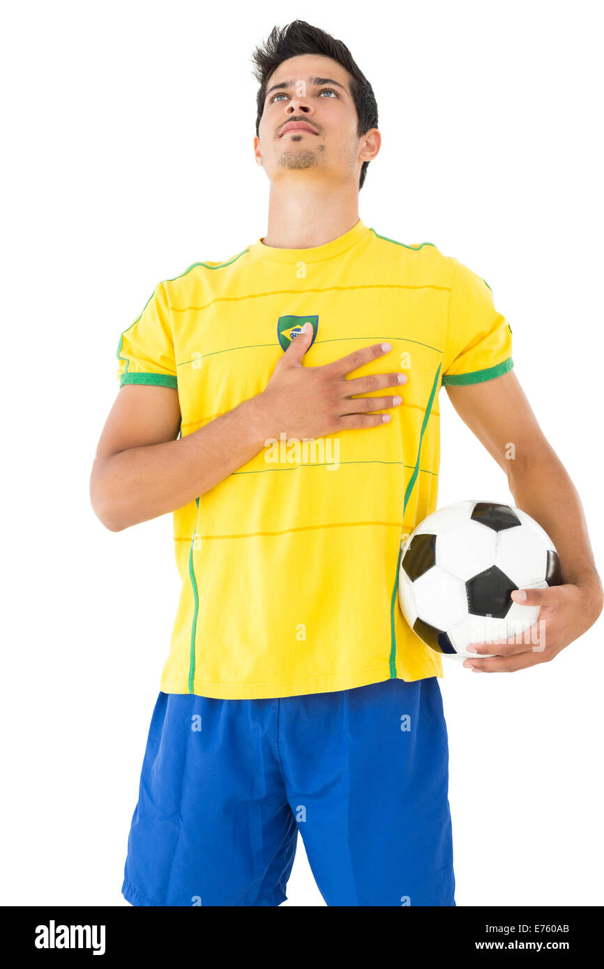 Brazilian football player listening to anthem Stock Photo