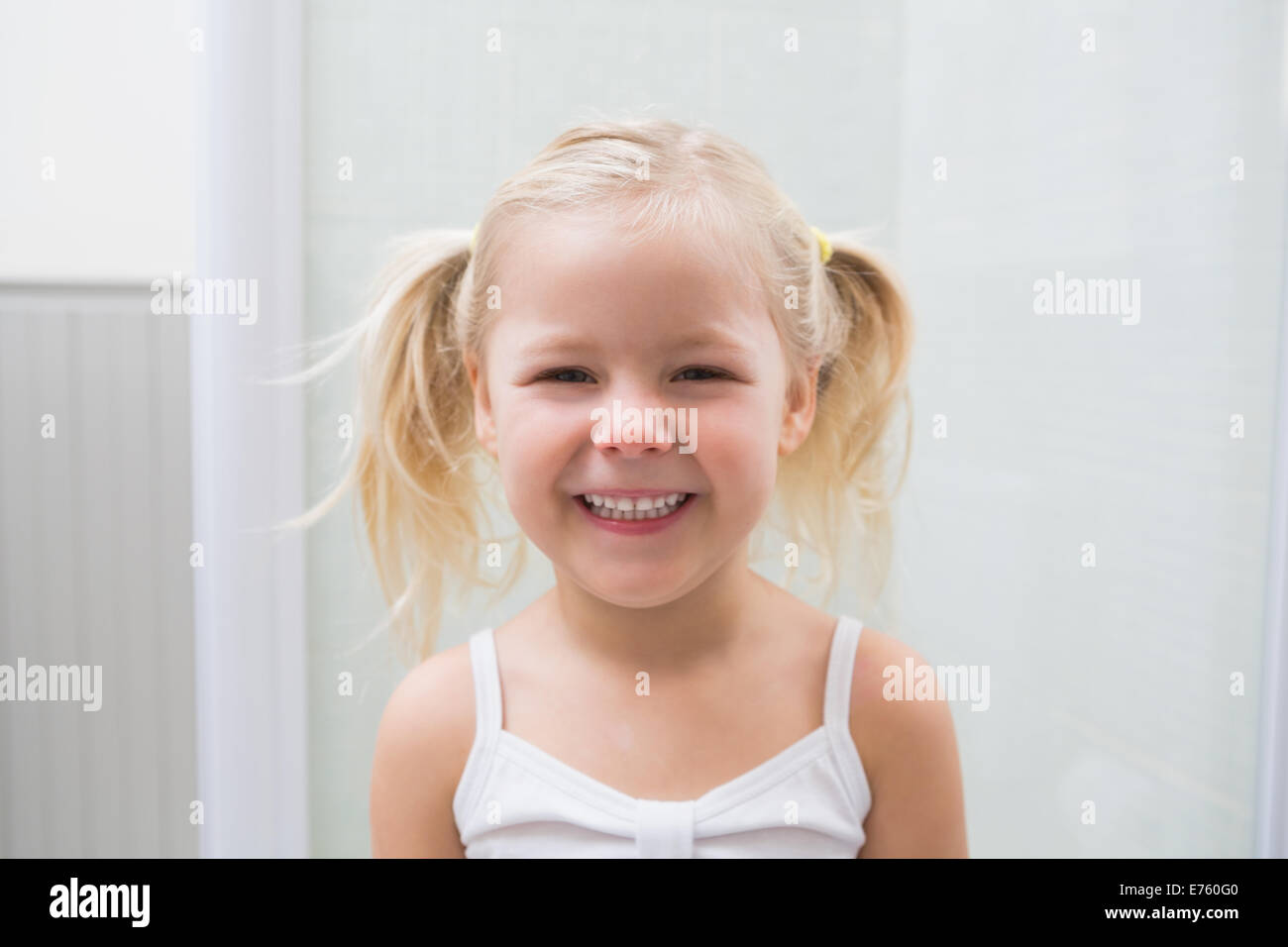 Girl pigtails smiling camera hi-res stock photography and images - Alamy