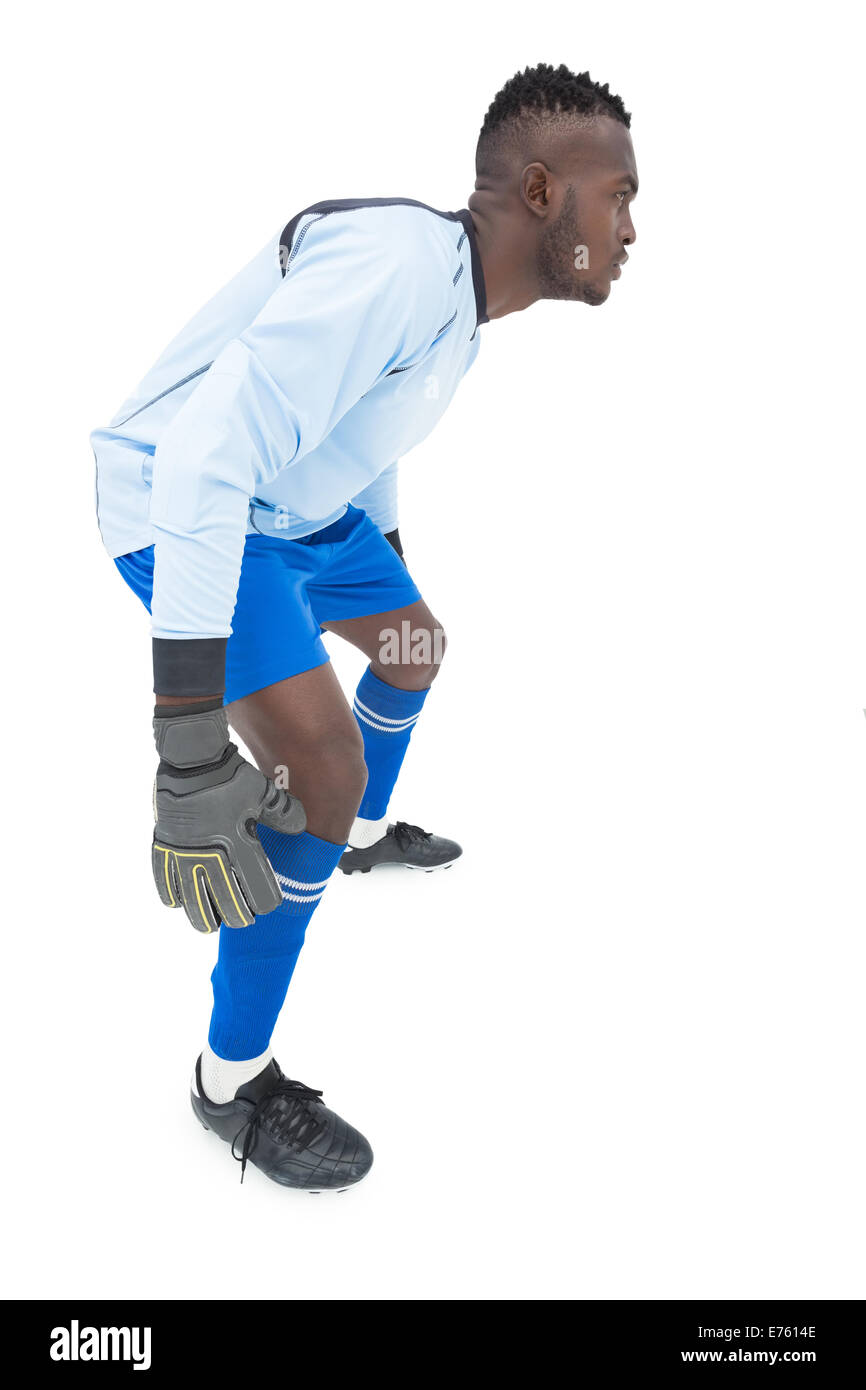 Side view of a concentrated goal keeper Stock Photo - Alamy