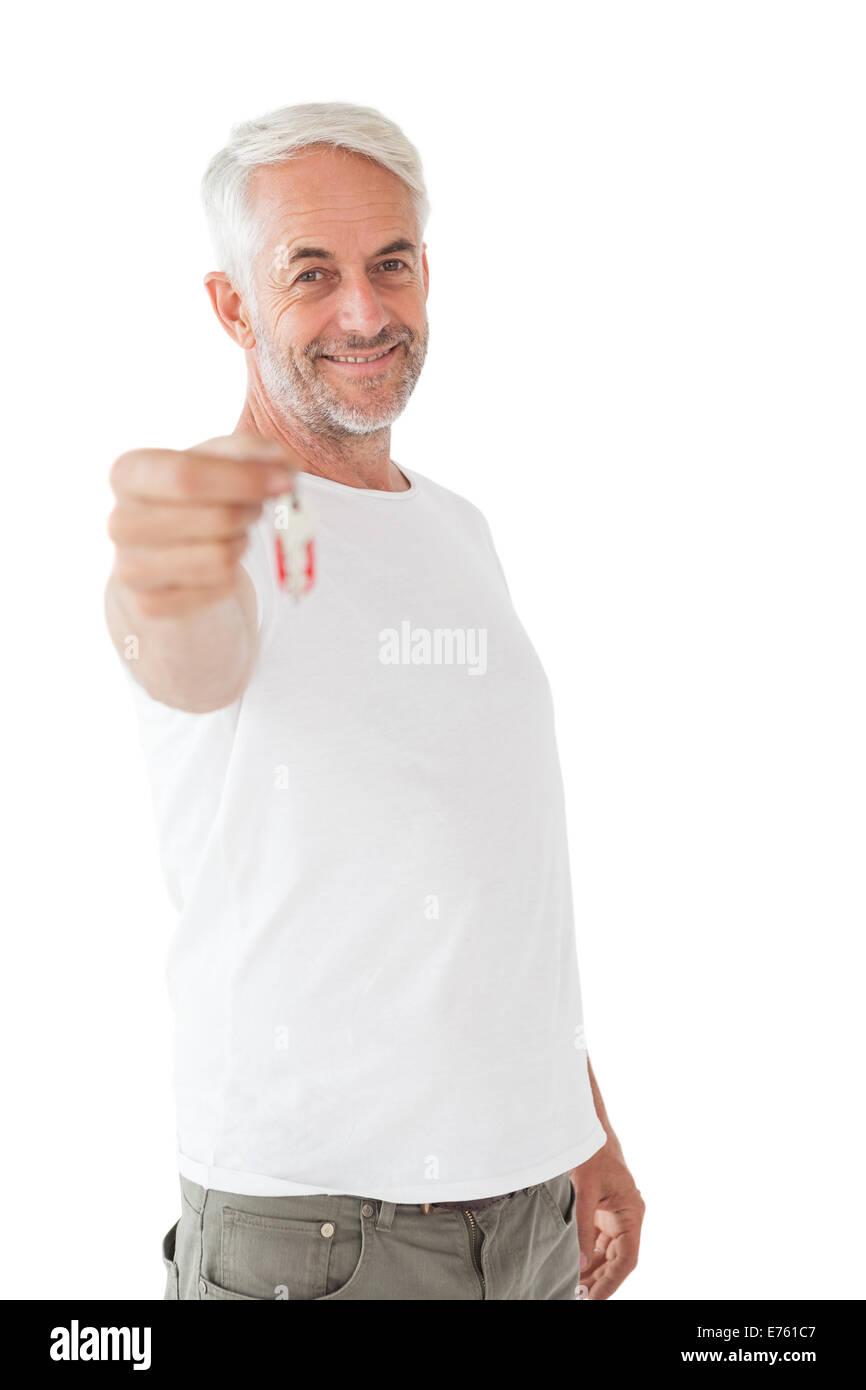 Happy mature man holding new house key Stock Photo - Alamy