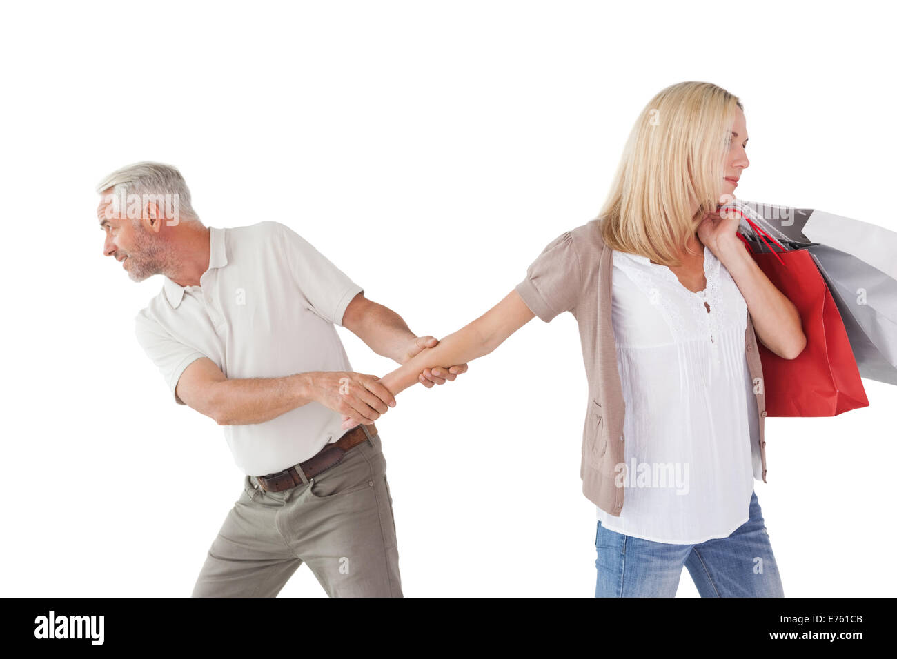 Couple man woman pulling hand hires stock photography and images Alamy