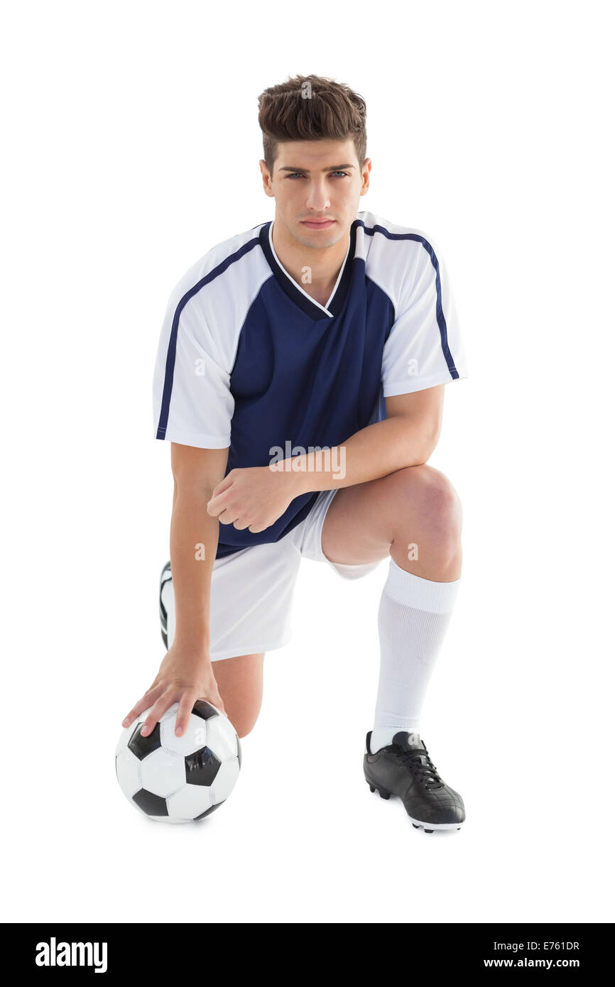 Portrait of a serious football player Stock Photo - Alamy