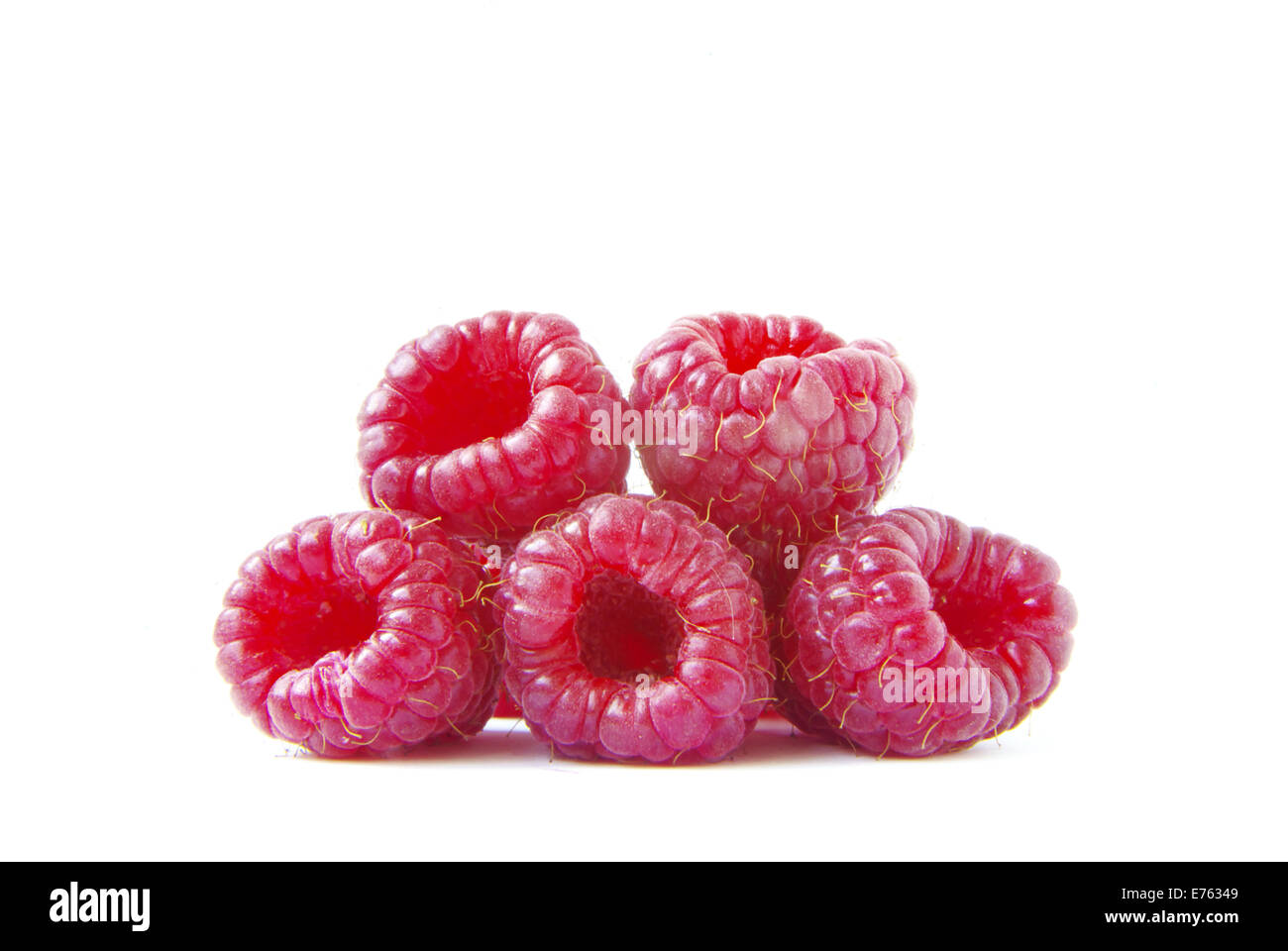 Ripe raspberry on a white background Stock Photo - Alamy