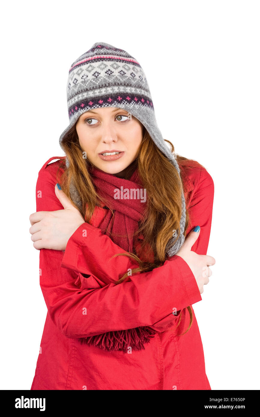 Cold redhead wearing coat and hat Stock Photo Alamy