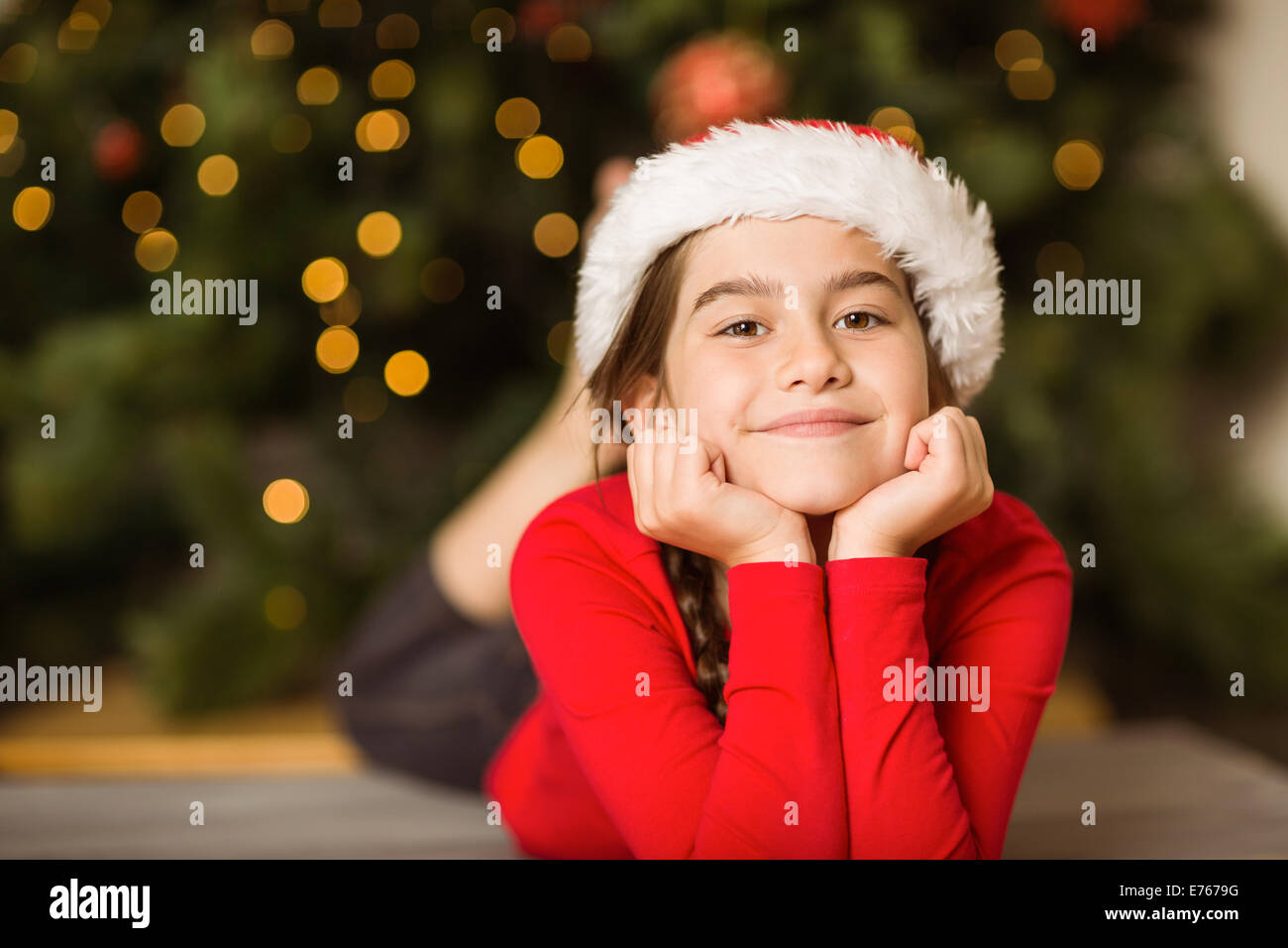 Festive little girl smiling at camera Stock Photo - Alamy