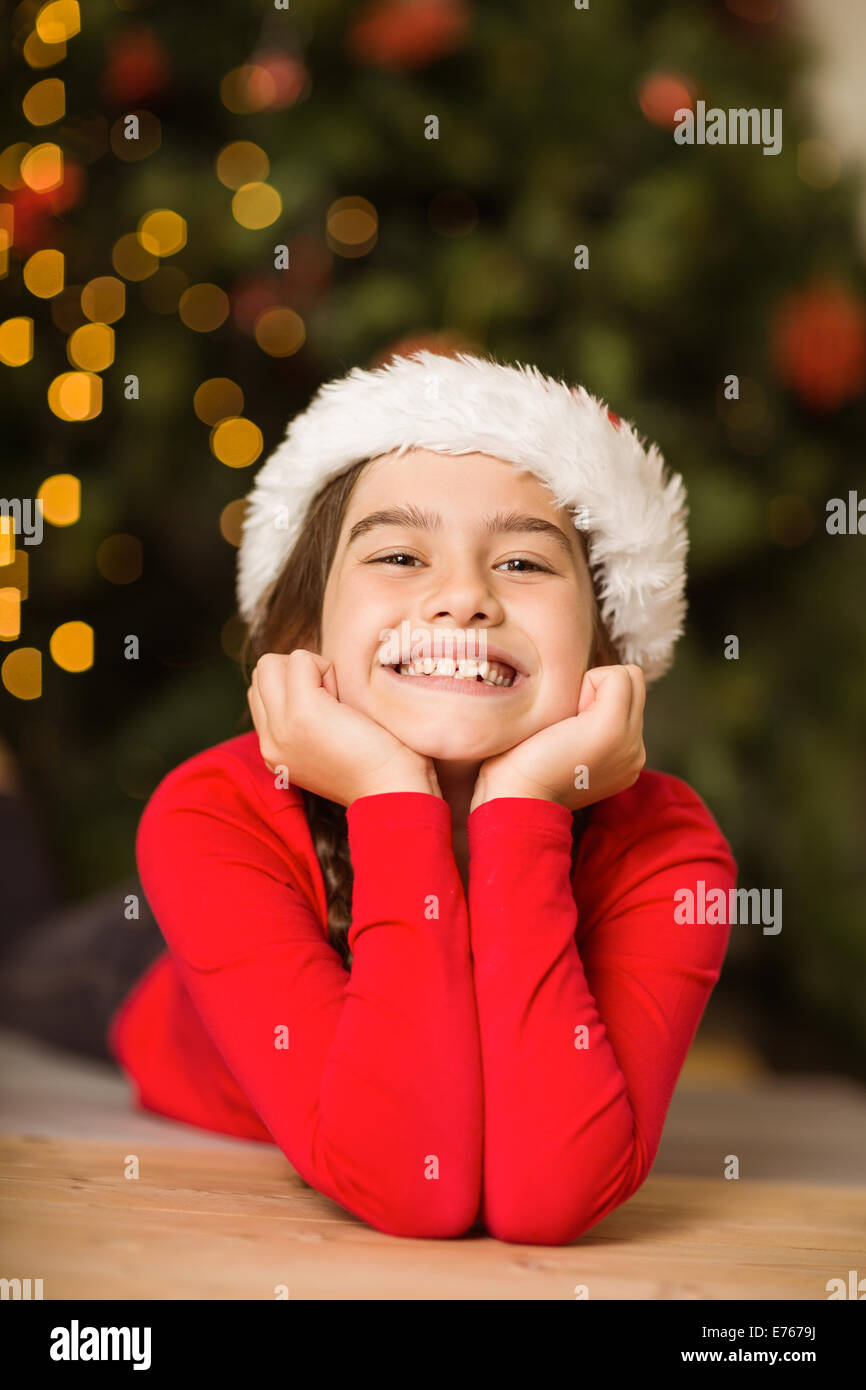 Festive little girl smiling at camera Stock Photo - Alamy