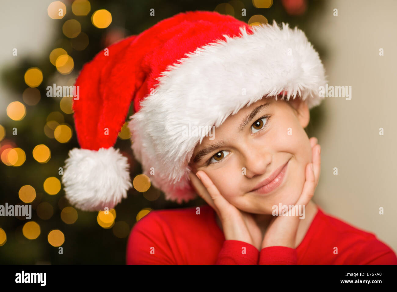 Festive little girl smiling at camera Stock Photo - Alamy