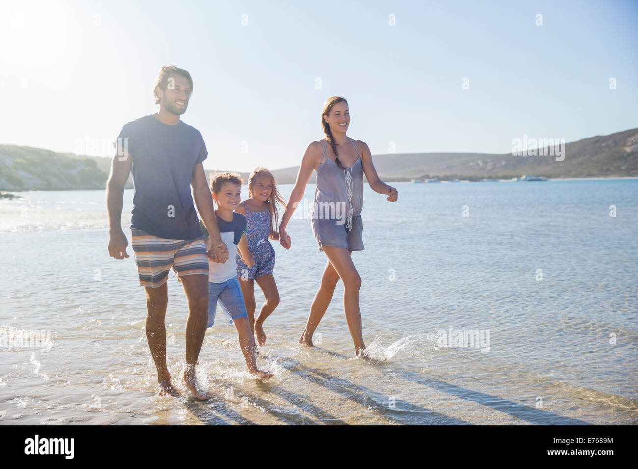 Caucasian family walking hi-res stock photography and images - Alamy