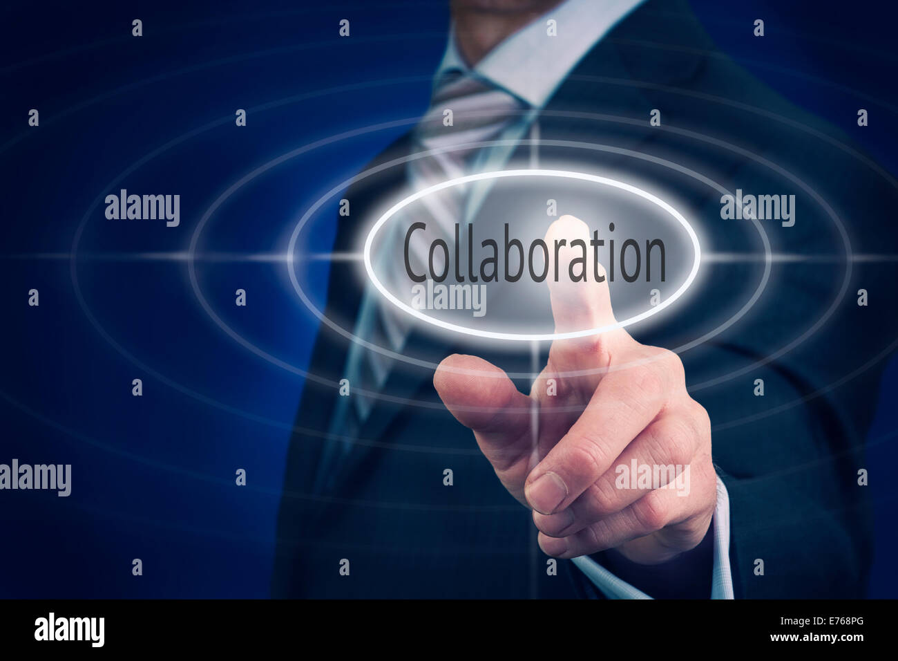 Businessman pressing a collaboration concept button. Stock Photo