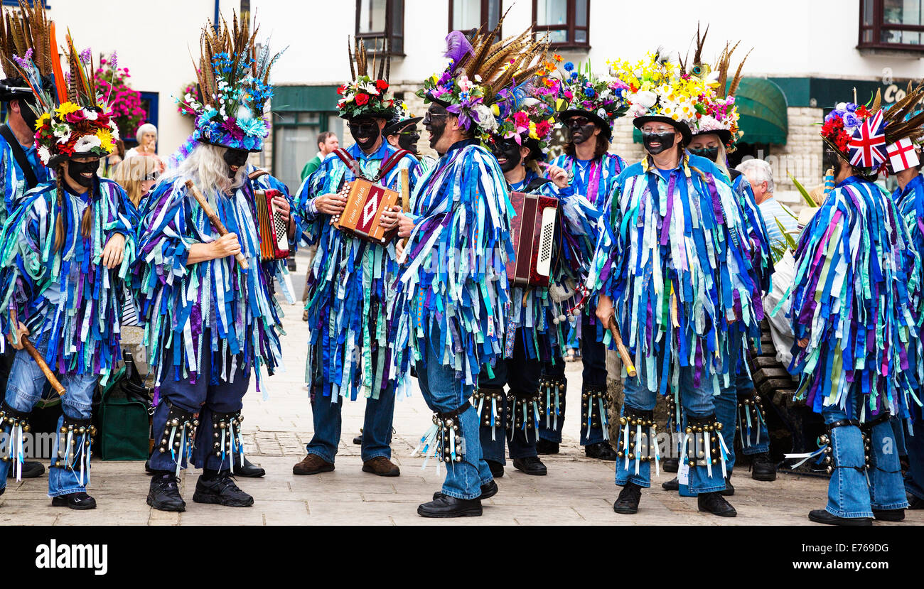 A group of Morris Dancers and musicians at Swanage Folk Festival, Dorset, UK. Stock Photo