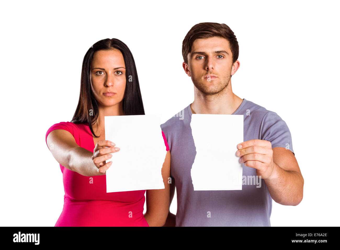 Couple showing broken piece of paper Stock Photo