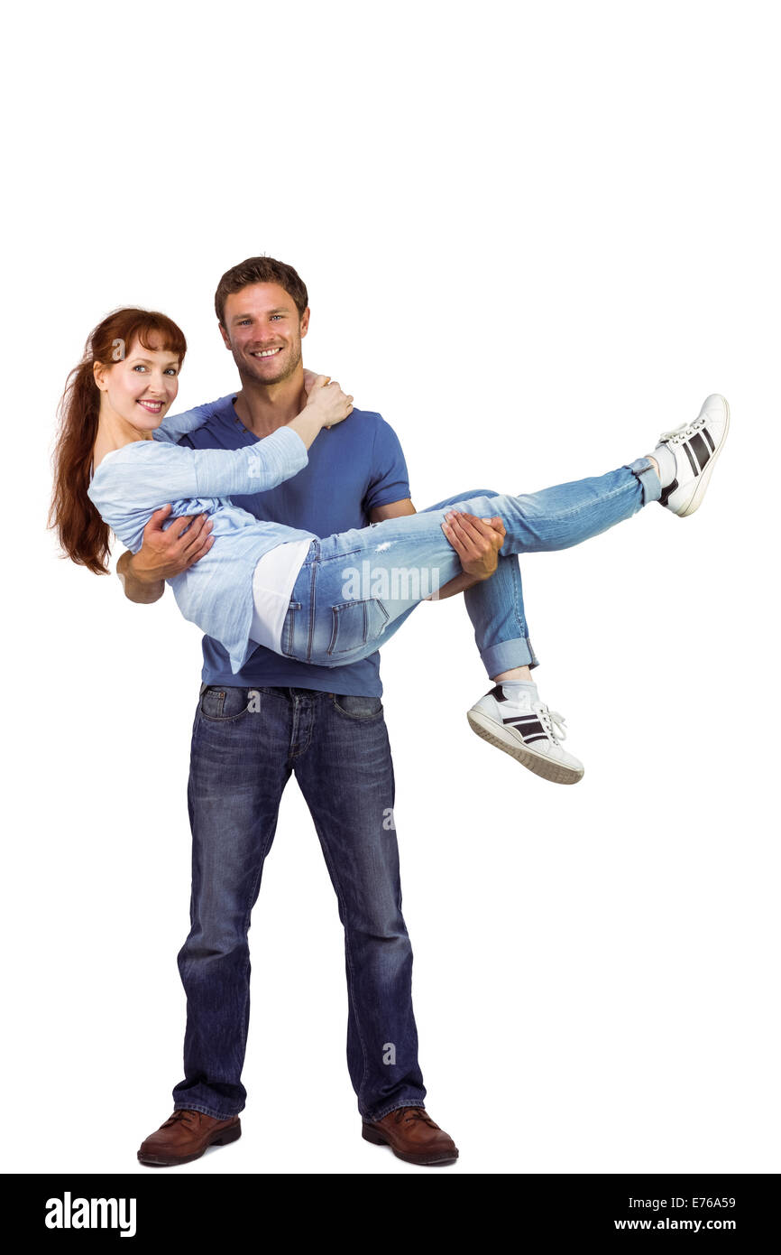 Man lifting up his girlfriend Stock Photo - Alamy