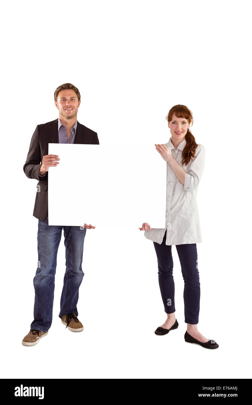 Woman holding large sign hi-res stock photography and images - Alamy