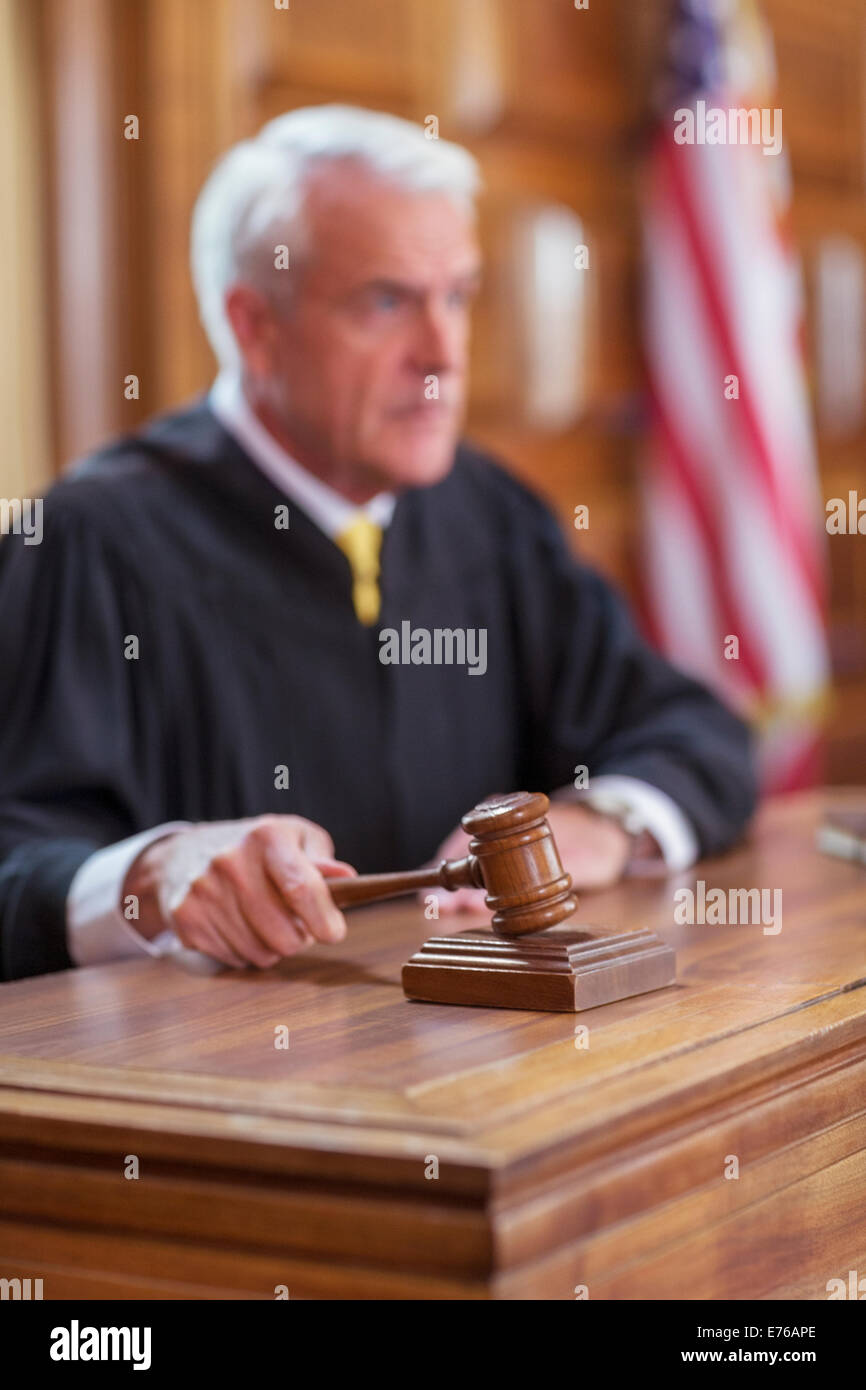 Judge banging gavel in court Stock Photo Alamy