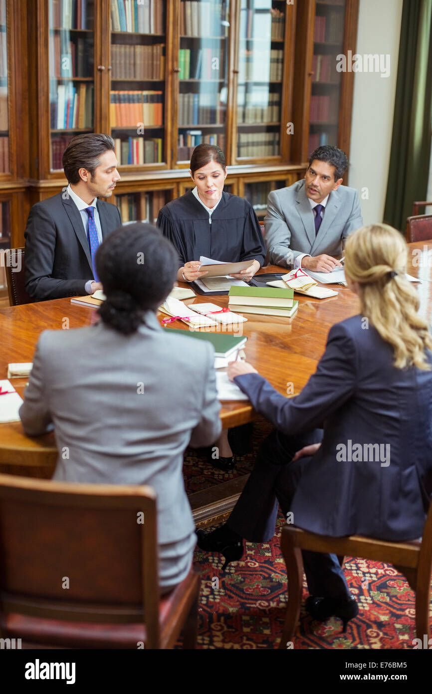 Judge and lawyers talking in chambers Stock Photo Alamy