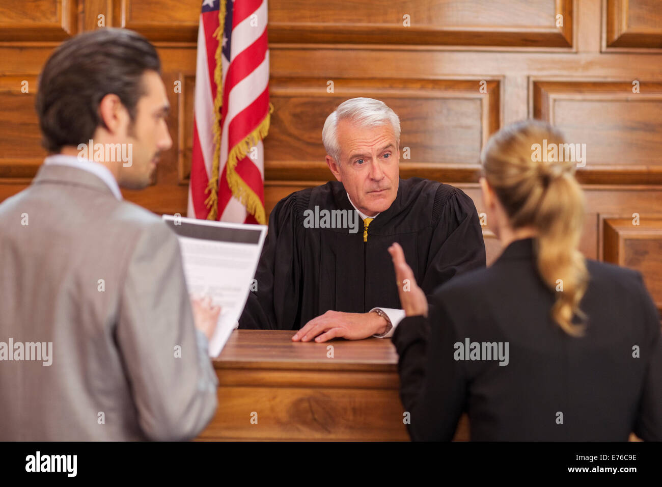 Lawyers pleading case to judge in court Stock Photo