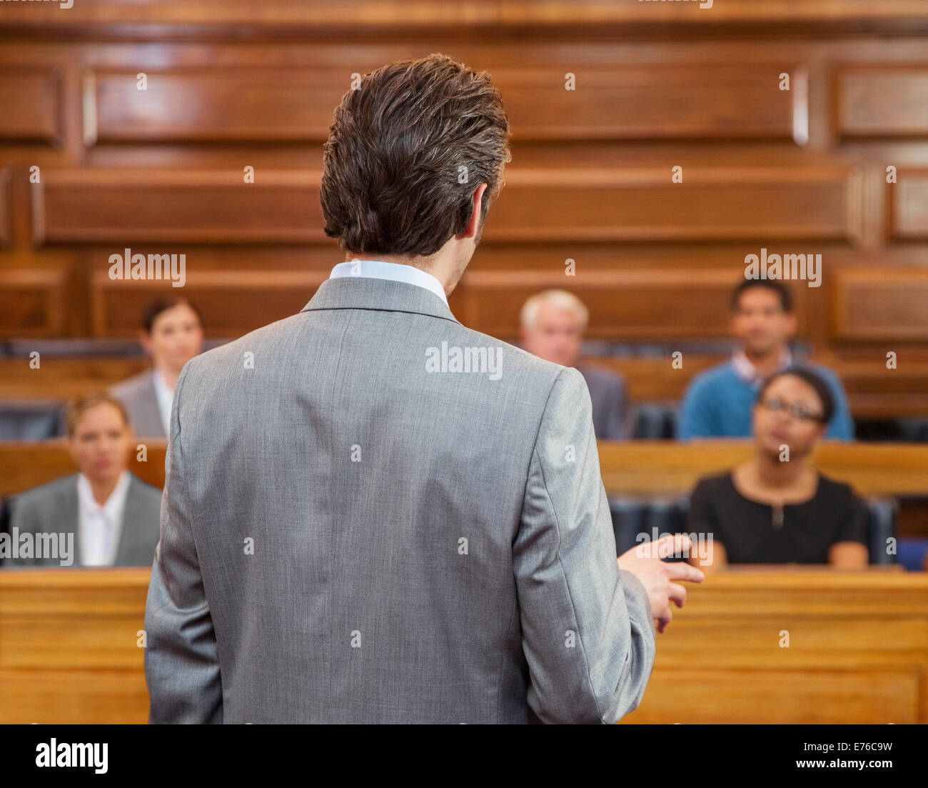Lawyer pleading case to jury in court Stock Photo