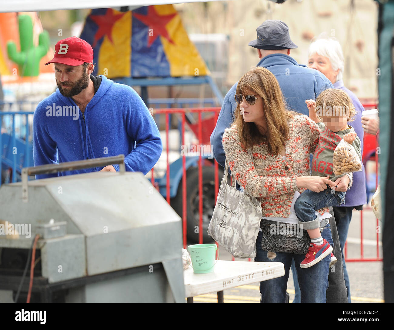 Selma Blair and Jason Bleick take their son, Arthur to the Farmers
