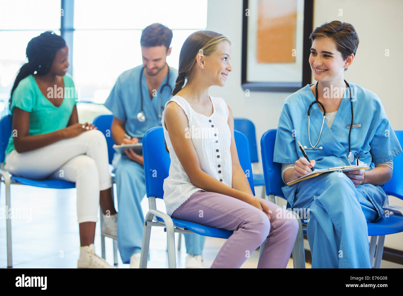 Nurse and patient talking in hospital Stock Photo