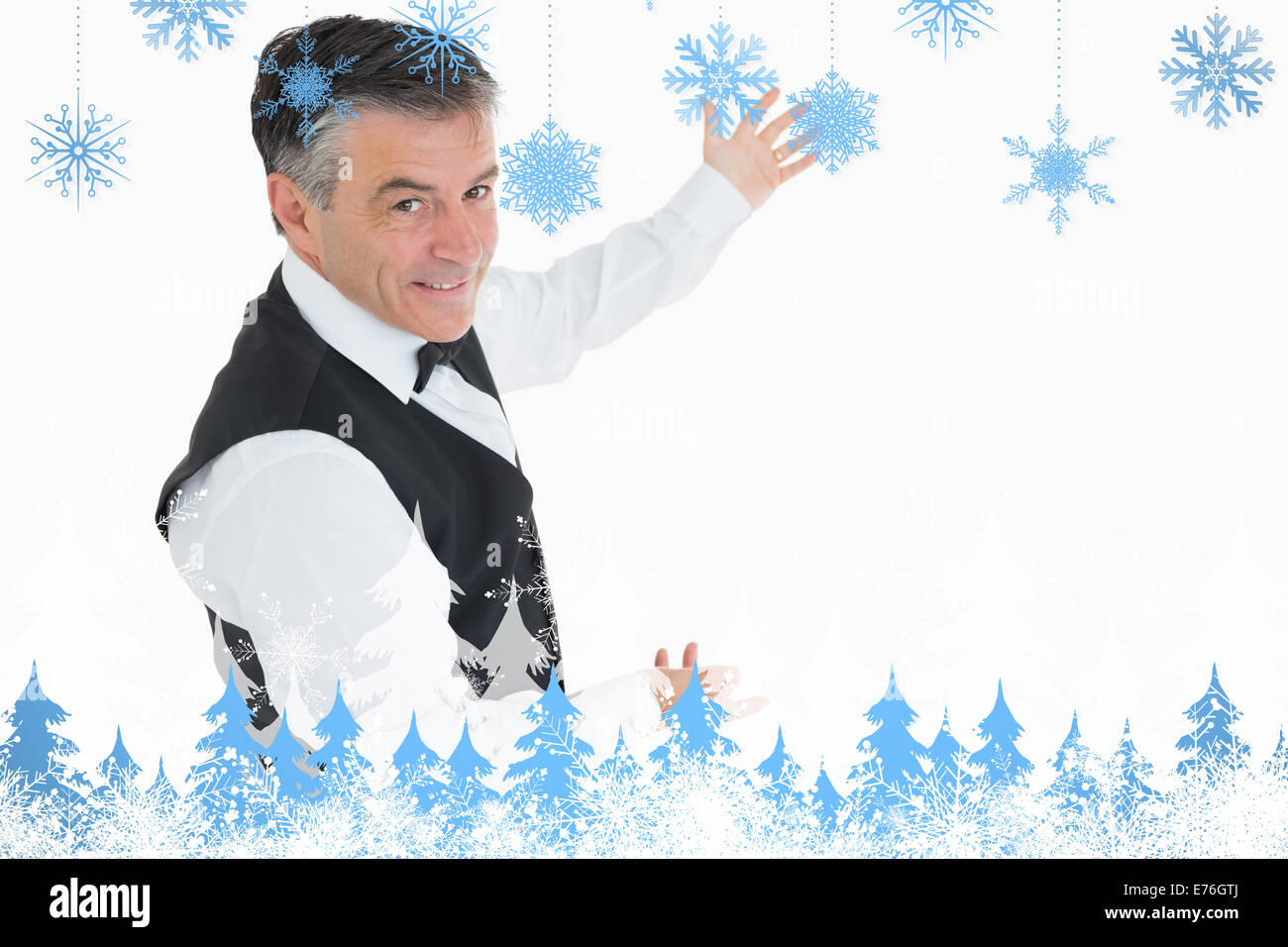 Composite image of welldressed man showing us something Stock Photo