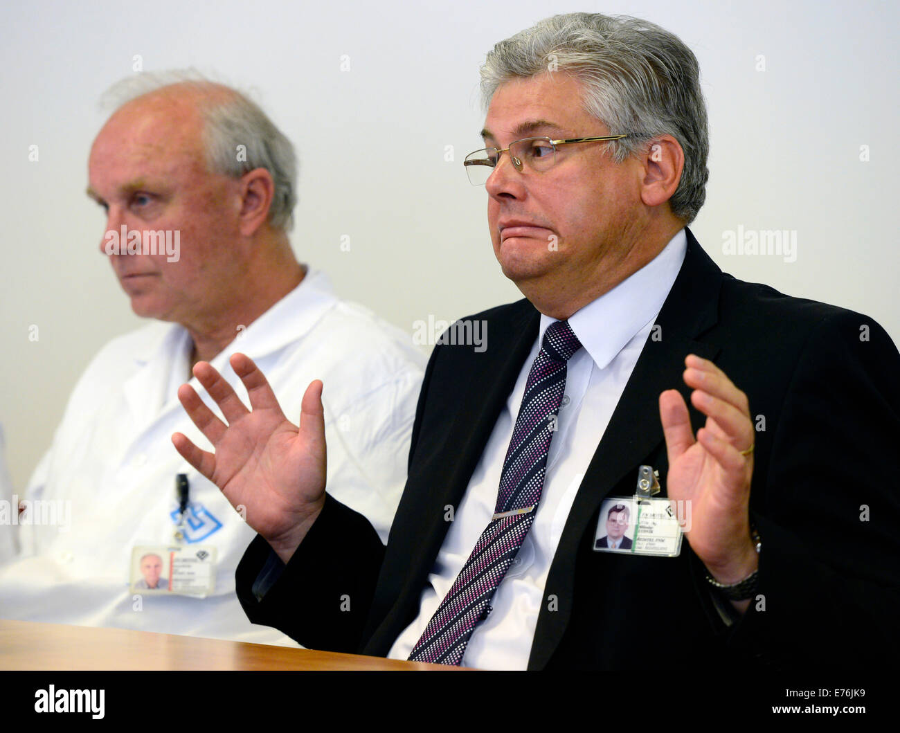 Director of the University Hospital in Motol Miloslav Ludvik, right, speaks at the press conference as the head of the Department of Pediatric Haematology and Oncology Jan Stary, left, looks on, in Prague, Czech Republic, on Monday, Sept. 8, 2014. Five-years-old Briton Ashya King with a brain tumour will be treated by protons in Prague, a doctors´ council decided today in Motol, where the boy will be hospitalised, the doctors have told journalists. According to news agencies, the boy left a Spanish hospital by an ambulance this morning and he is supposed to be flown to Prague. (CTK Photo/Roman Stock Photo