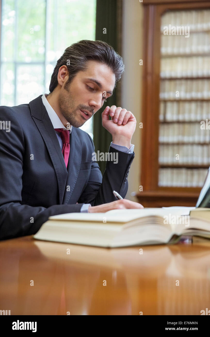 Lawyer doing research in chambers Stock Photo