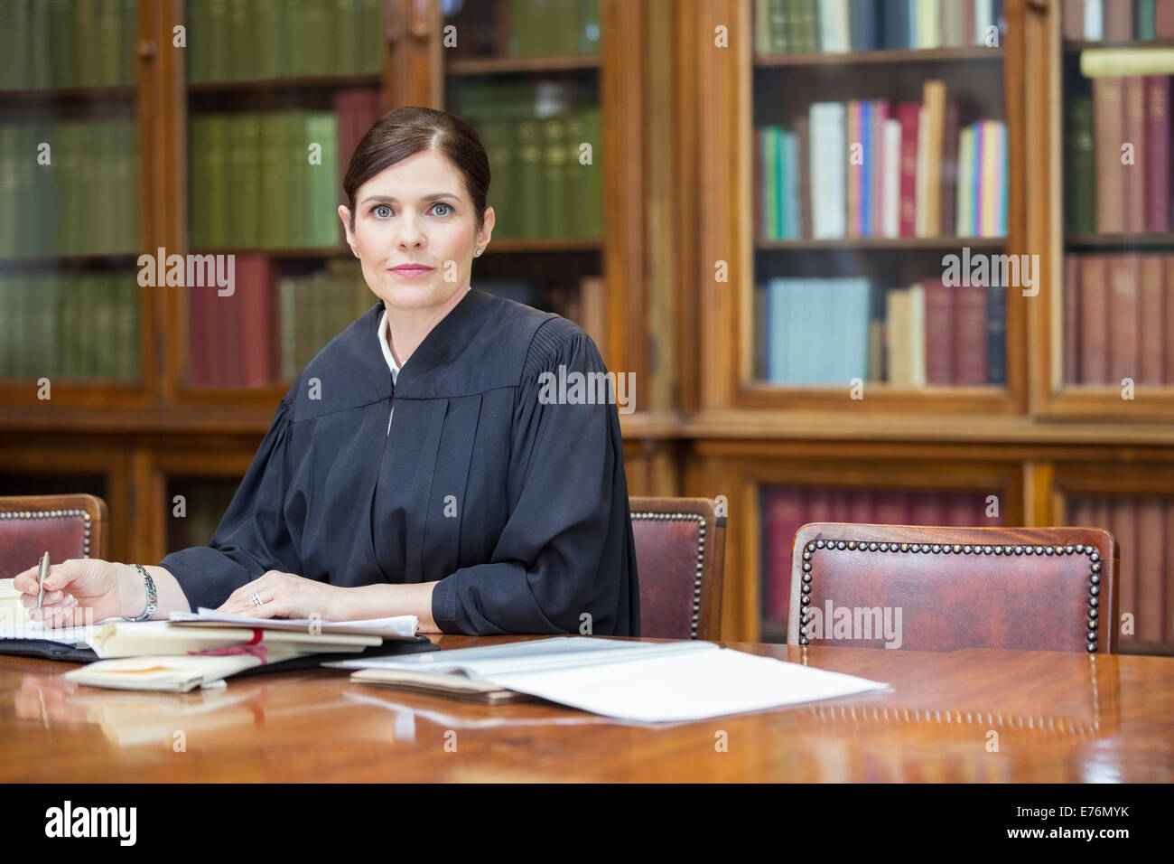 Judge doing research in chambers Stock Photo