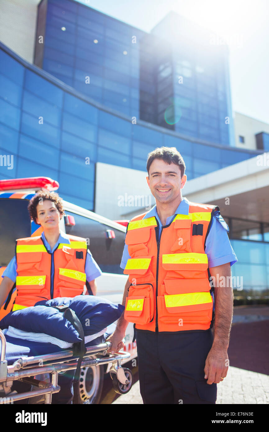 Paramedics smiling outside hospital Stock Photo Alamy
