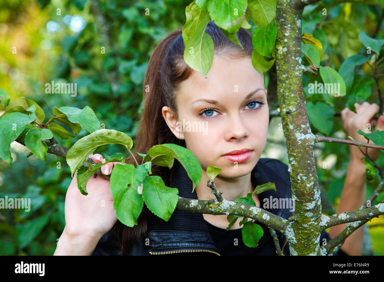 Portrait of the girl among foliage Stock Photo