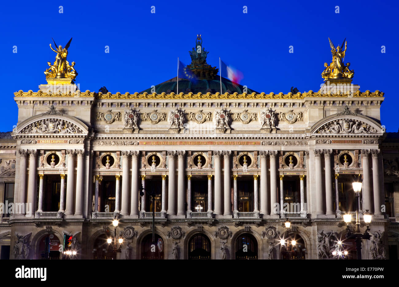 The magnificent Palais Garnier at dusk in Paris, France. The Palais is