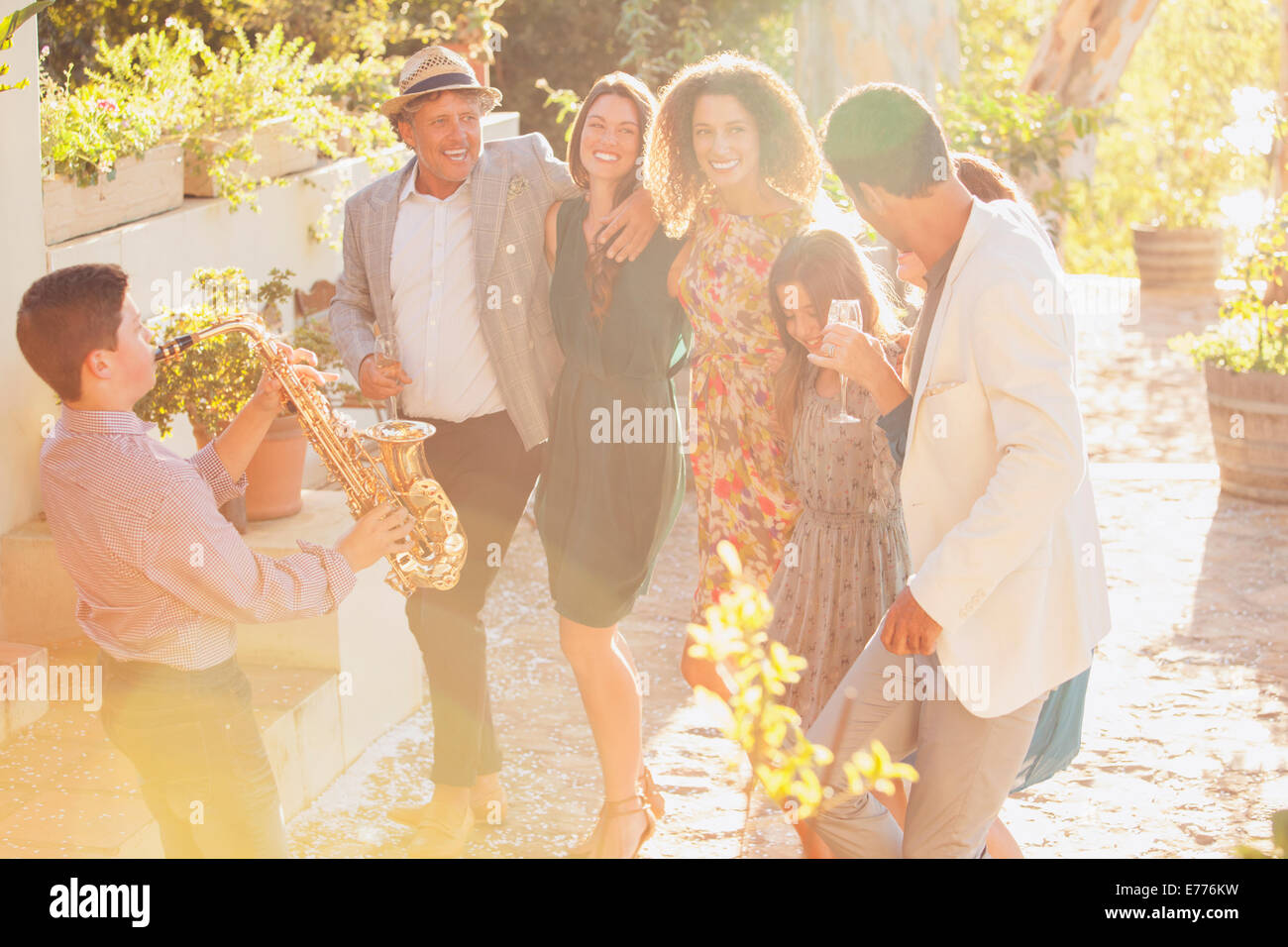 Family dancing together outdoors Stock Photo