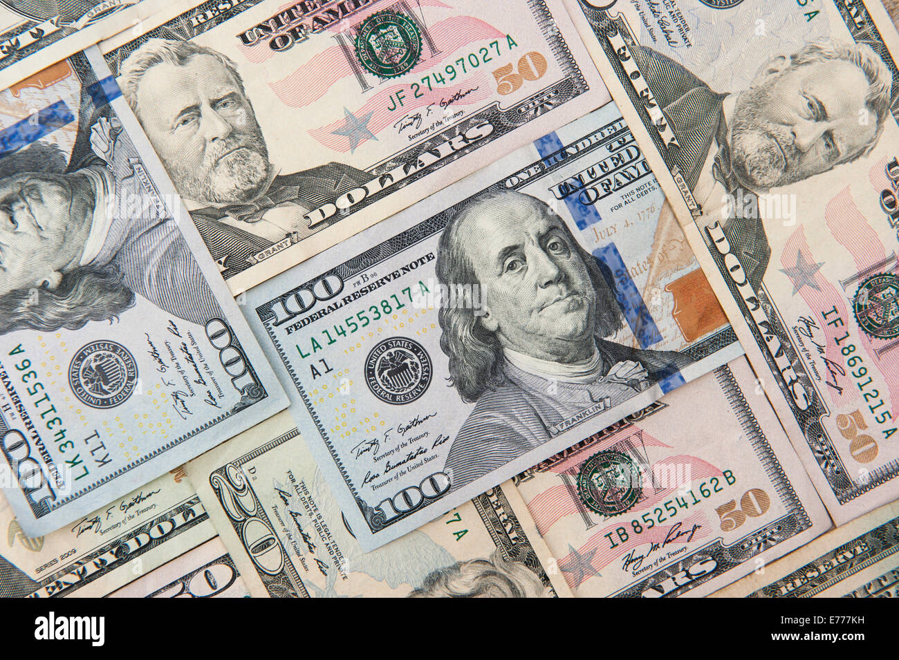 Background of  American currency in various denominations Stock Photo