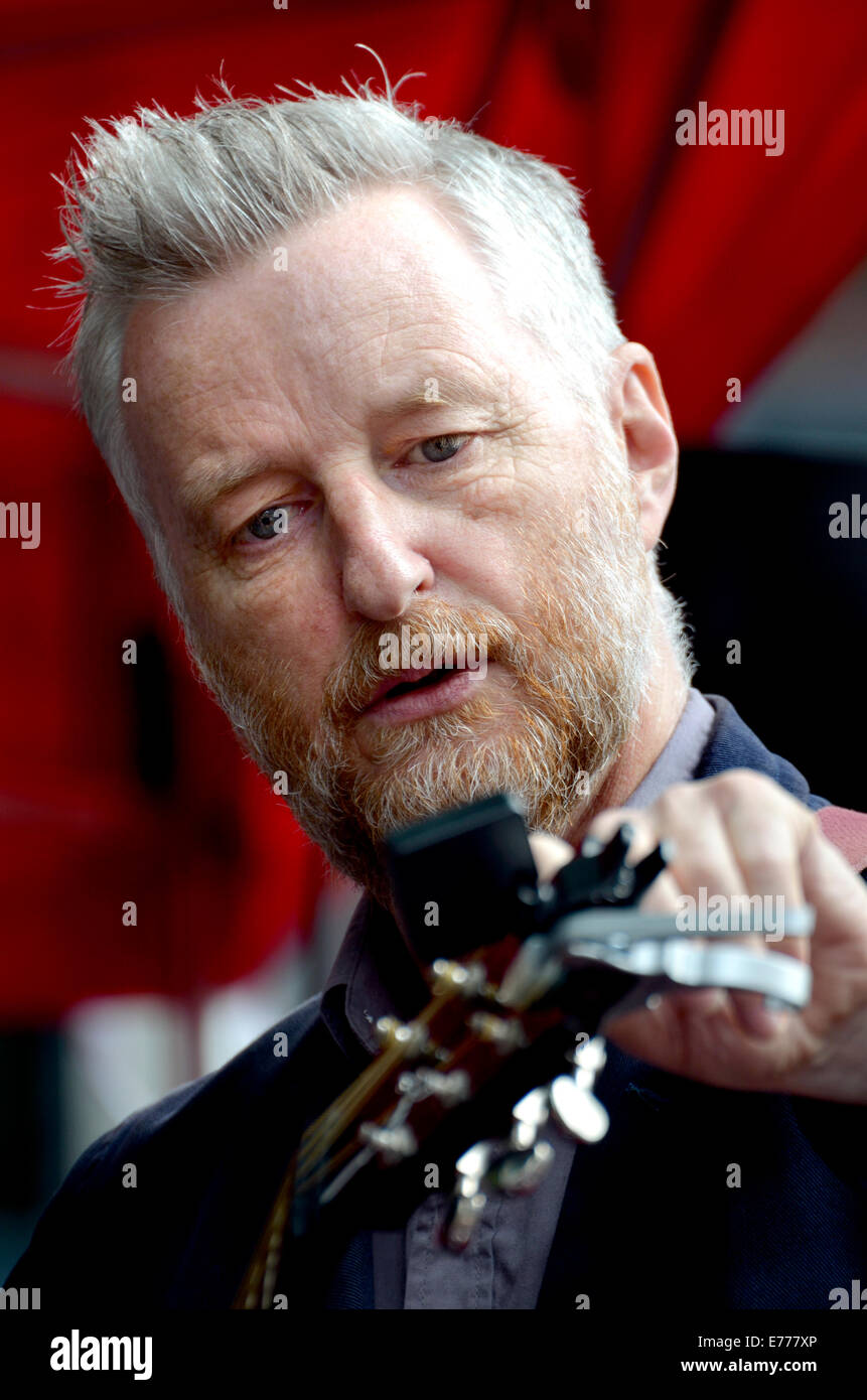Billy Bragg (singer and left-wing campaigner) at a rally in Trafalgar Square against privatisation of the NHS, 2014 Stock Photo