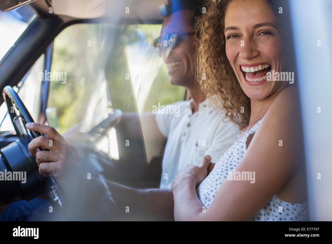 Couple riding in car together Stock Photo