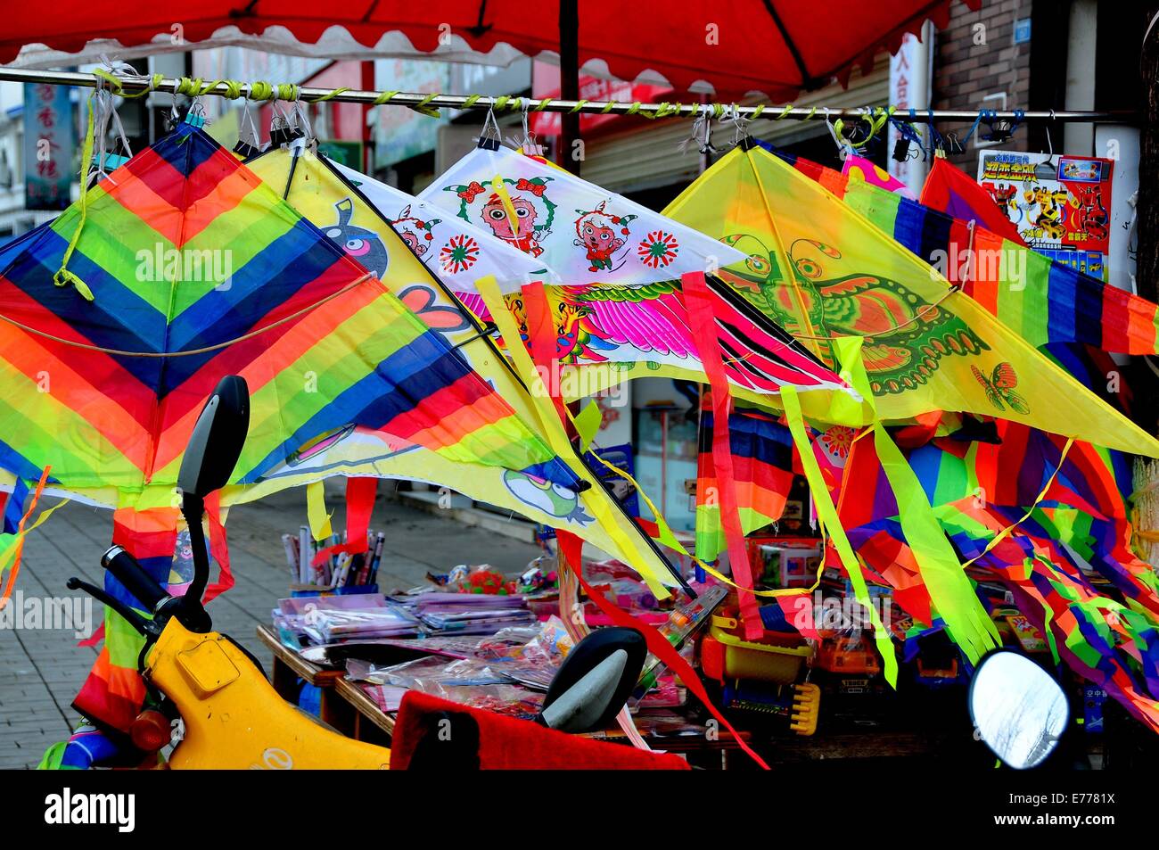 PENGZHOU, CHINA Colourful Chinese New Year kites on display in front
